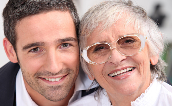 Glenn and his mother smiling